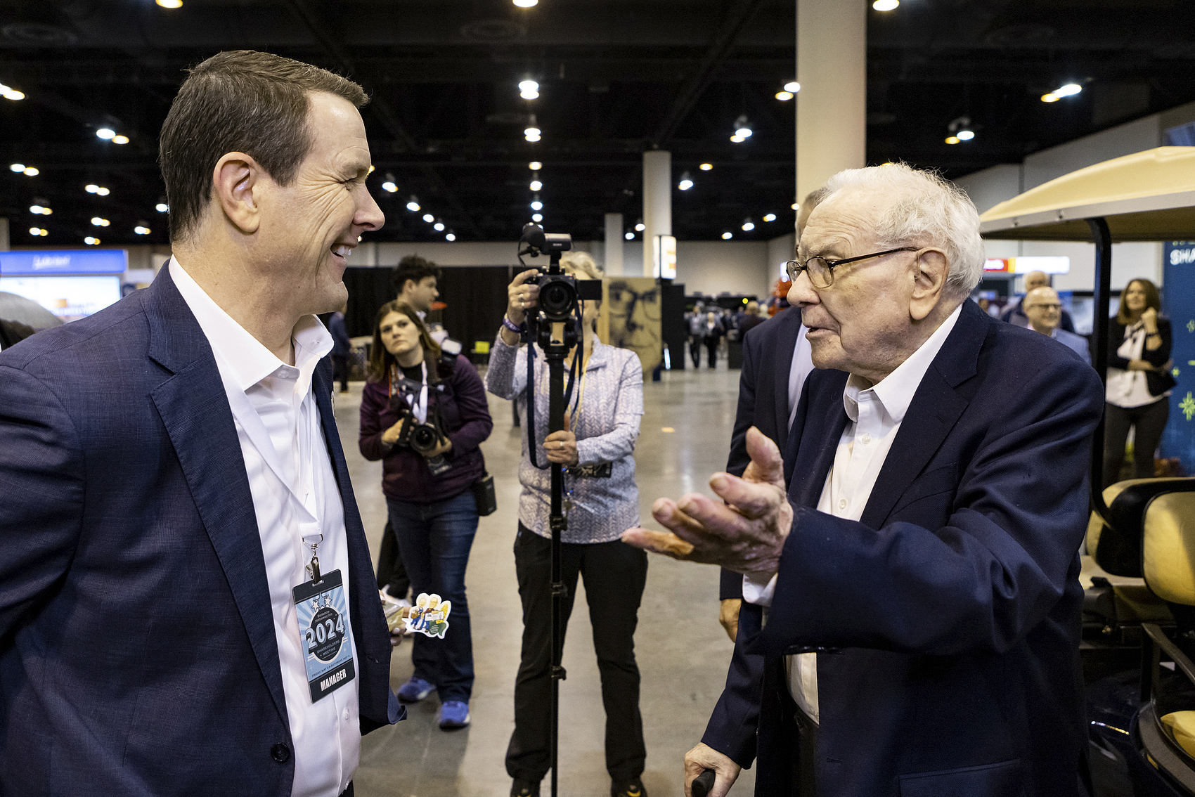 See's Candies CEO with Warren Buffett at the Berkshire Hathaway Shareholder Meeting 2024